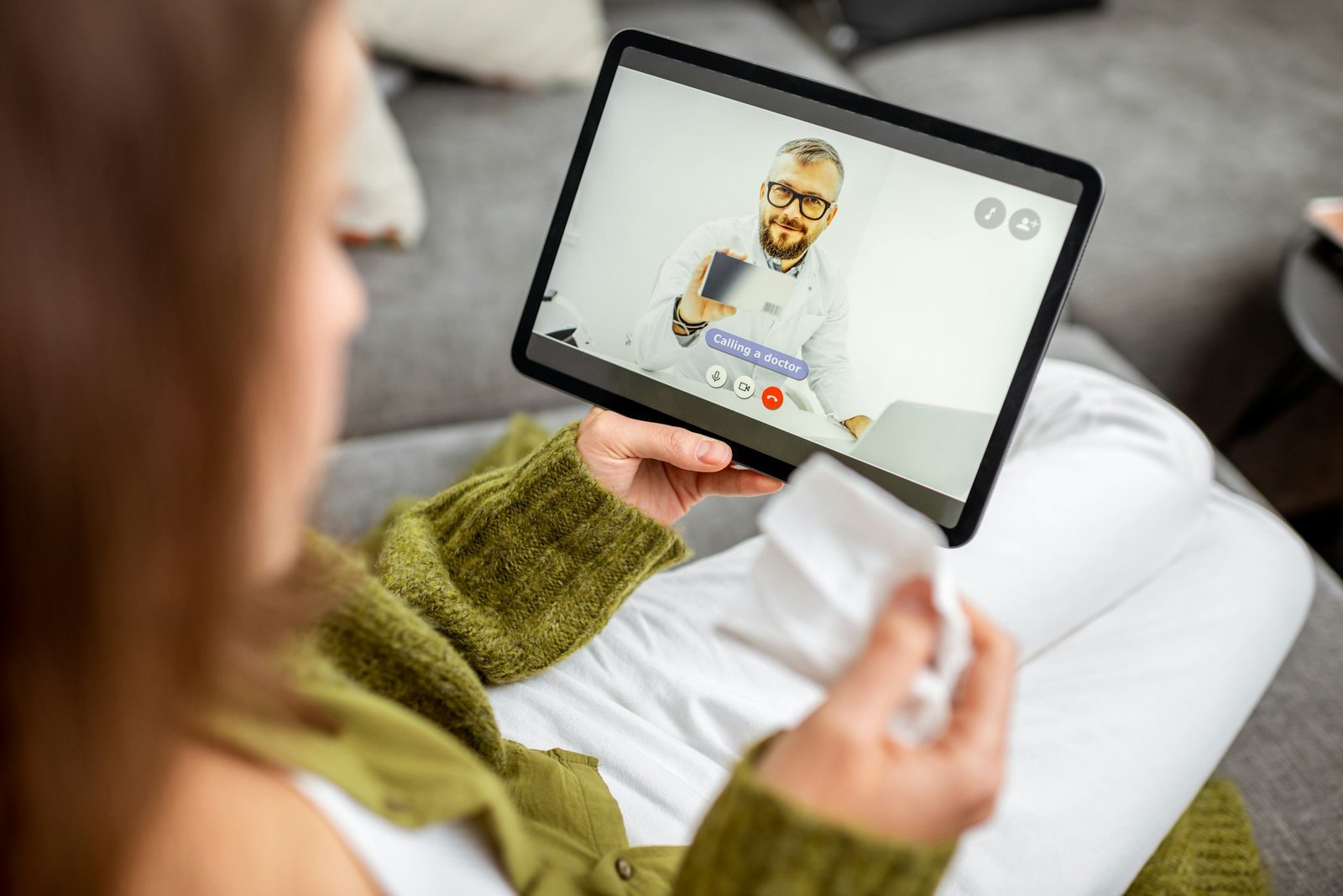 Woman talking with a doctor. Online medicine concept